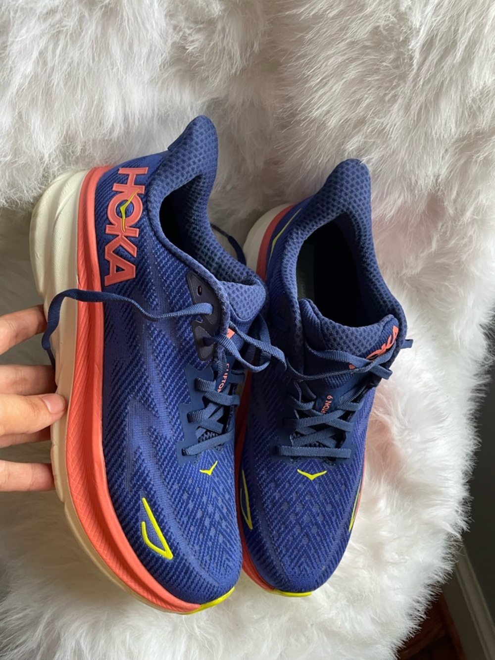 Hoka Women's Navy Blue Running Shoes with Coral Midsole and Neon Yellow Accents